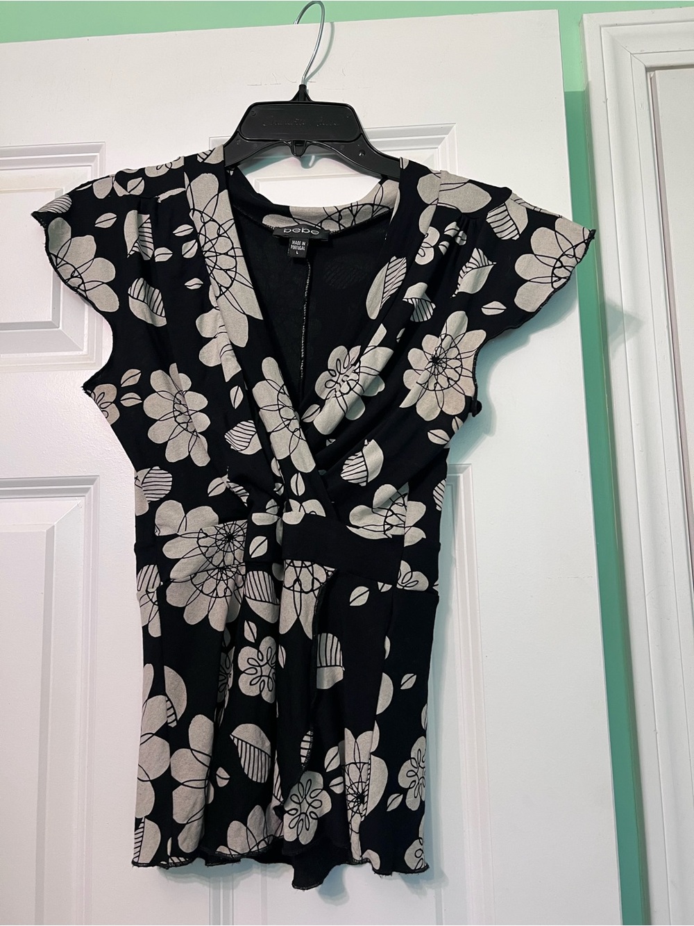 bebe Black Top with Cream Floral Print